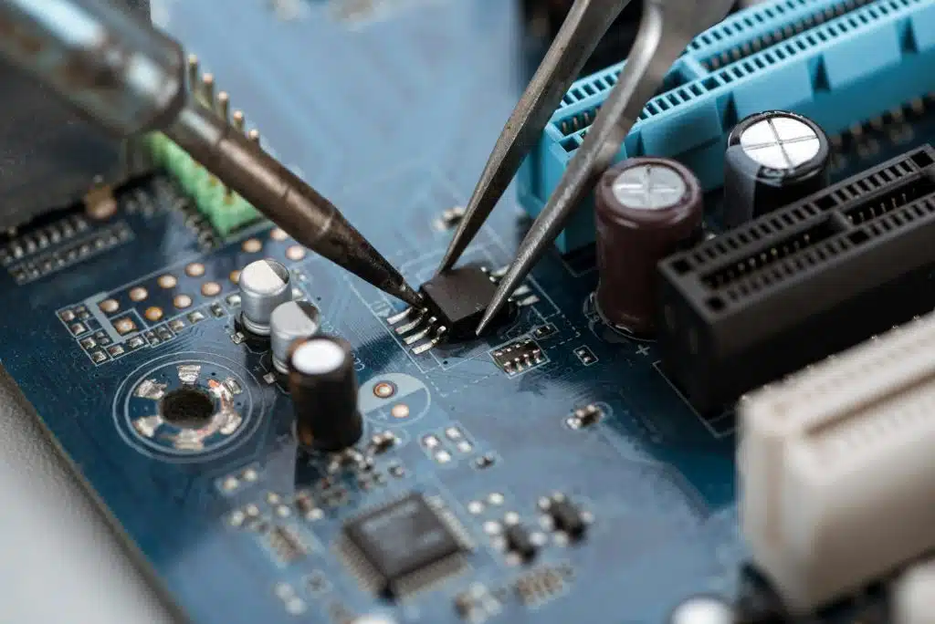soldering typical desktop computer baseboard close up view