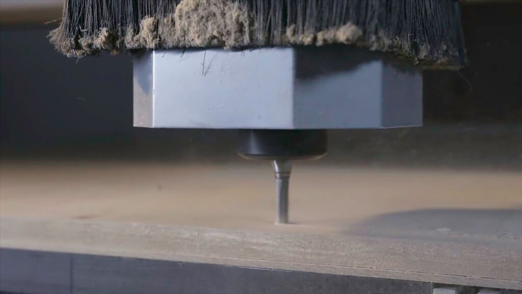 Close up of woodworking process, CNC milling machine, manufacture concept. Action. Drilling tool in