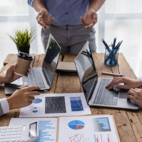 Business people advisors talk, planning analyze investment and marketing on a tablet in the office. Initial Consultation